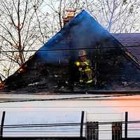 <p>The fire was quickly knocked down and contained to the attic.
  
</p>