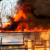 <p>Garfield's deputy fire chief advised of heavy fire from the attic area and transmitted a second alarm at 72 Bergen Street.</p>