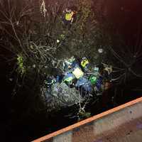 <p>Emergency workers working to save the man.&nbsp;</p>