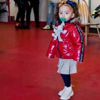 <p>Leilani is reunited with her rescuers at the Hasbrouck Heights firehouse.</p>