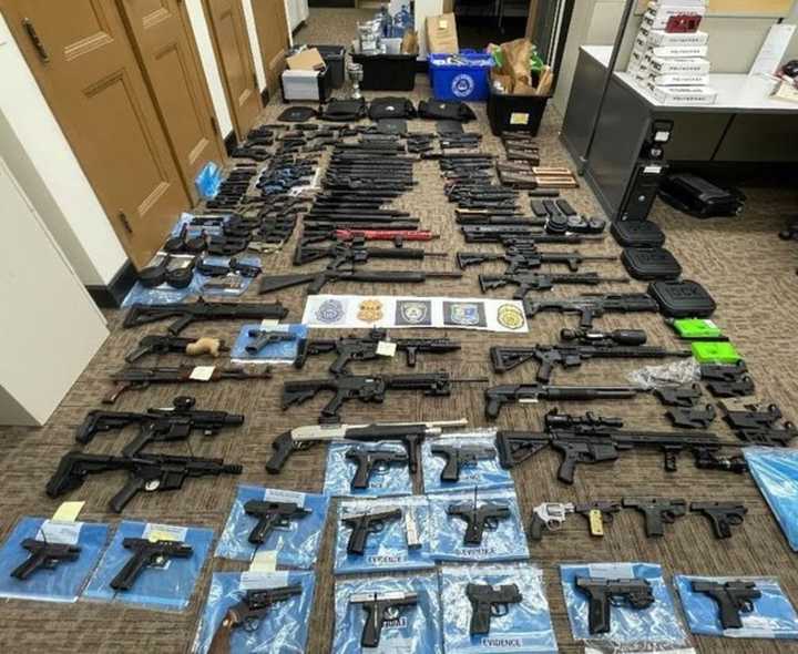 Police seized an arsenal of weapons and more than $100,000 worth of drugs from a home in Longmeadow.&nbsp;