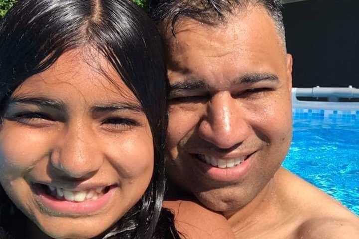 Anthony Garcia and daughter Emily, 14.