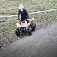 <p>The orange and white ATV.&nbsp;</p>