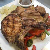 <p>Berkshire Pork Chop Giambotta with Broccoli Rabe from at Anthonys.</p>