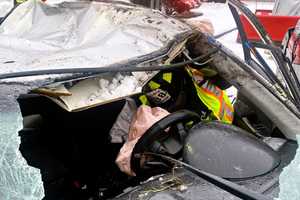 DOING A 360: Sedan Slams Into Parked SUV, Rolls Completely At Route 17 Gas Station