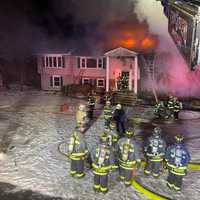 <p>Firefighters on scene of a fire in Parsippany.&nbsp;</p>