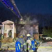 <p>Firefighters at a house fire in Parsippany.&nbsp;</p>