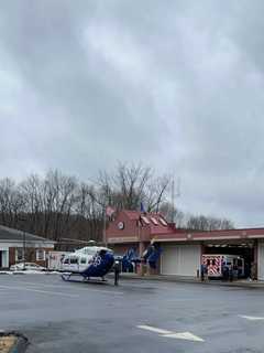 Man Rushed To Hospital By Helicopter After Being Pinned Between Car, Building In Carmel