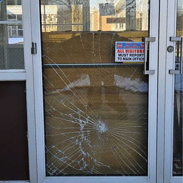 Damage to a door at the Griebling School in Howell Township, NJ, after a deer crashed into it.