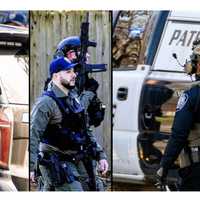 <p>The man emerged shortly after 3:30 p.m. and was taken into custody in his driveway.
  
</p>