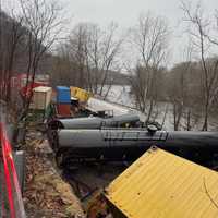 <p>Many cars derailed in the triple train crash.</p>