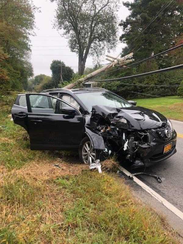 Crash Closes Road, Knocks Down Utility Pole In Area