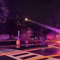 <p>Aerial ladders hit the building from two sides.</p>