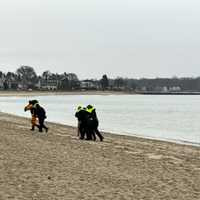 <p>Westport firefighters and other first responders help those impacted out of the water.</p>