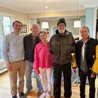 <p>Letterman and the Bealle family in the kitchen.&nbsp;</p>