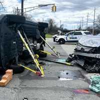 <p>Firefighters extricated a female passenger, responders said.</p>