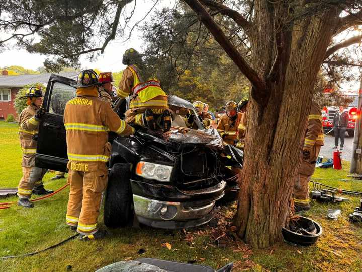 Firefighters respond to a pickup that crashed into a tree in Marmora, NJ.