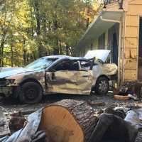 <p>A car crashed into a utility pole and then a house in Chestnut Ridge.</p>