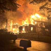 <p>Police and firefighters found the 2,800-foot home on Cheyenne Drive in Franklin Lakes fully engulfed.</p>