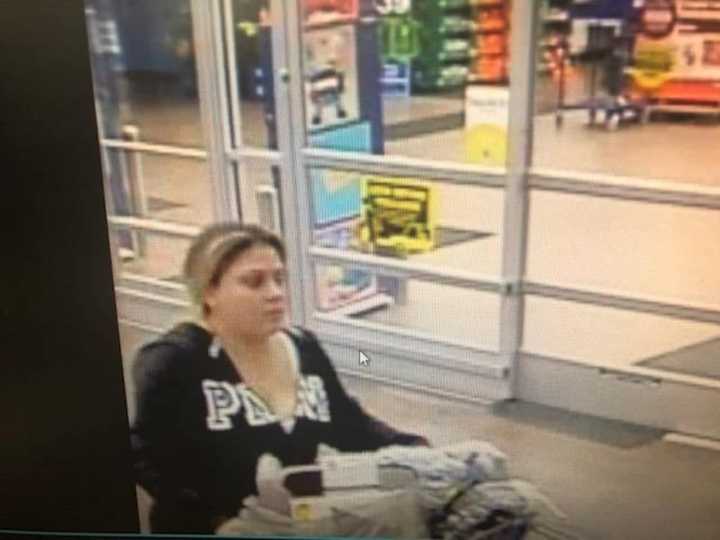 Police in Shelton have released surveillance photos of a woman who allegedly used a stolen credit card.