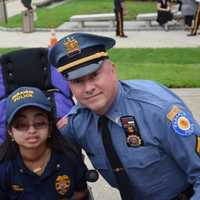 <p>Neha Kurian and Detective Sgt. James Teehan at 2016 Chief for a Day.</p>