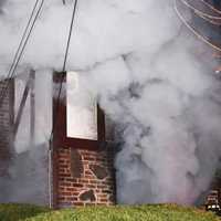 <p>Smoke billowed from the Bellaire Avenue home.</p>