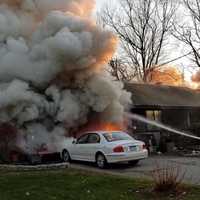 <p>Trumbull firefighters rescued a cat during a garage fire on Monday.</p>