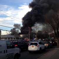 <p>Black smoke filled the air around the shopping center.</p>