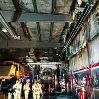 <p>Yorktown Heights Volunteer firefighters battle a blaze at a school bus depot.</p>