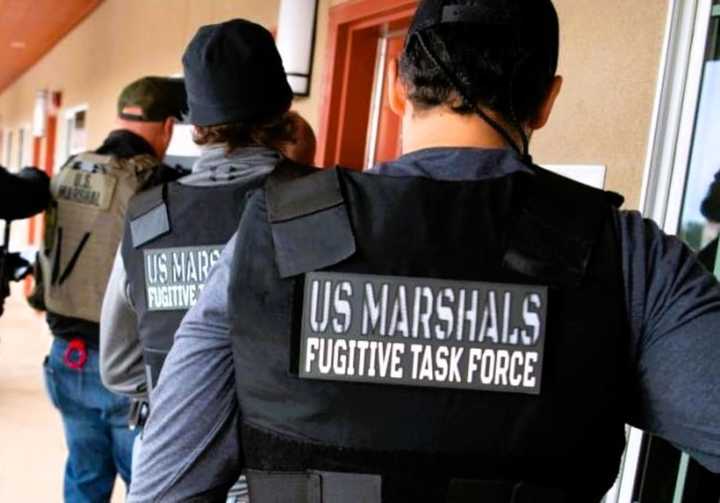 Members of the U.S. Marshals Service captured two fugitives from an armed robbery at a Dollar General store in Vineland.