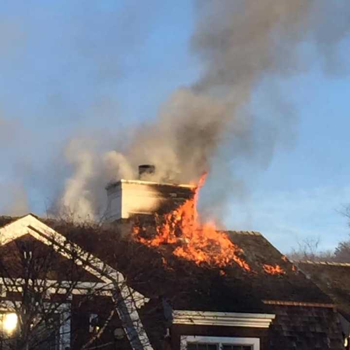 A fire tore through the roof of a Chappaqua mansion over the weekend.