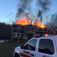 <p>A fire tore through the roof of a Chappaqua mansion over the weekend.</p>