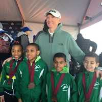 <p>The 4 x 400 relay team that placed  at the indoor national championships with their coach, Joe McMahon from the Yonkers track club. Relay medalists, from left to right, are: Kyle Snow, Aaron Irish Bramble, Sachin Ramharak and Dean Vazquez.</p>