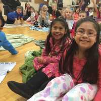 <p>Many dressed in comfortable pajamas, and toted favorite blankets and pillows to enjoy Bloomingdale&#x27;s PTA Family Reading Night</p>