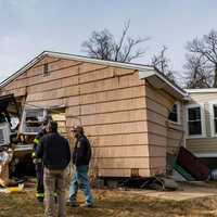 <p>A tree service truck slammed into a home.</p>