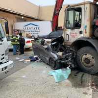 <p>One person is critical following a crash with a garbage truck.</p>