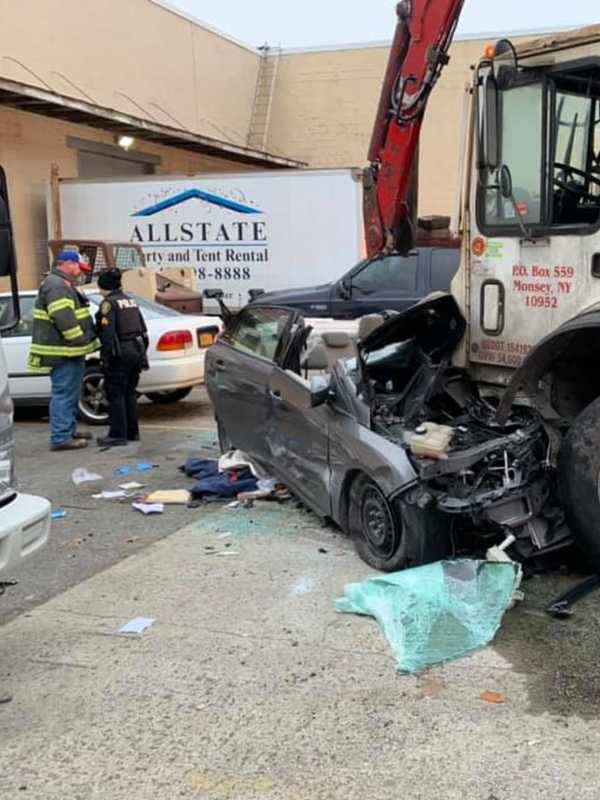 Garbage Truck Driver Ticketed After Route 59 Crash Leaves One Critical