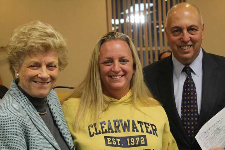 Dawn Altamuro, center, is honored with the 2014 Mayor&#x27;s Volunteer Award by Franklin Lakes Council President Paulette Ramsey, at left, and Mayor Frank Bivona, at right.