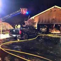 <p>A couple of vehicles were destroyed, but the home was saved by firefighters.</p>