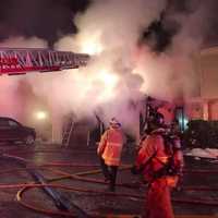 <p>A garage fire displaced five residents in Bethel.</p>