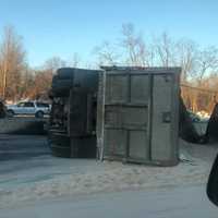 <p>Dump truck overturned on Route 80.</p>