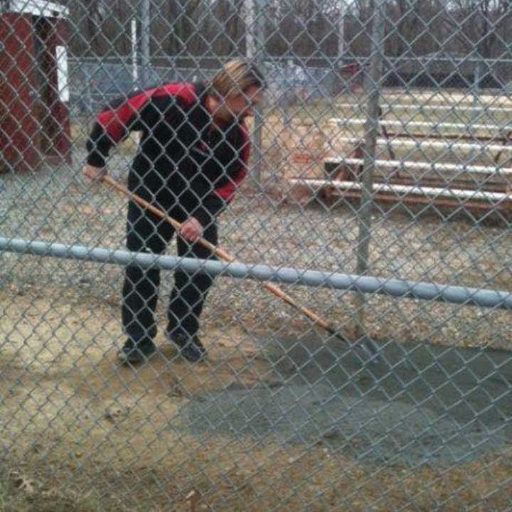 Joe Kleinot works on the Pompton Lakes baseball fields.