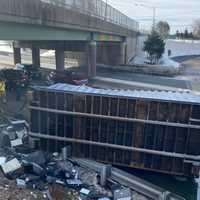 <p>The container partially landed on the guardrail in the Route 208 mishap in Fair Lawn.</p>