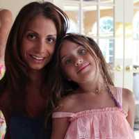 <p>Ginger Pierro of Hawthorne and her daughter, Gia.</p>