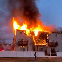 <p>At the scene of the early-morning townhouse condo fire on Home Place in Lodi on Tuesday.</p>