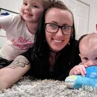 <p>Patrick Claffertty with his his partner and two children.</p>