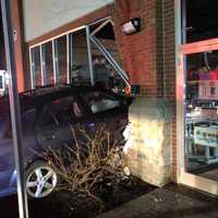 <p>A vehicle crashed into a building after losing control.</p>