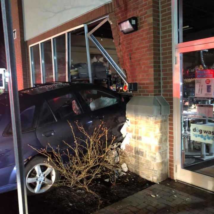 A vehicle crashed into a building after losing control.