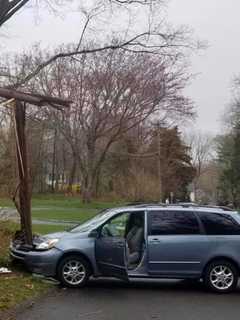 Van Slams Into Utility Pole In Westport