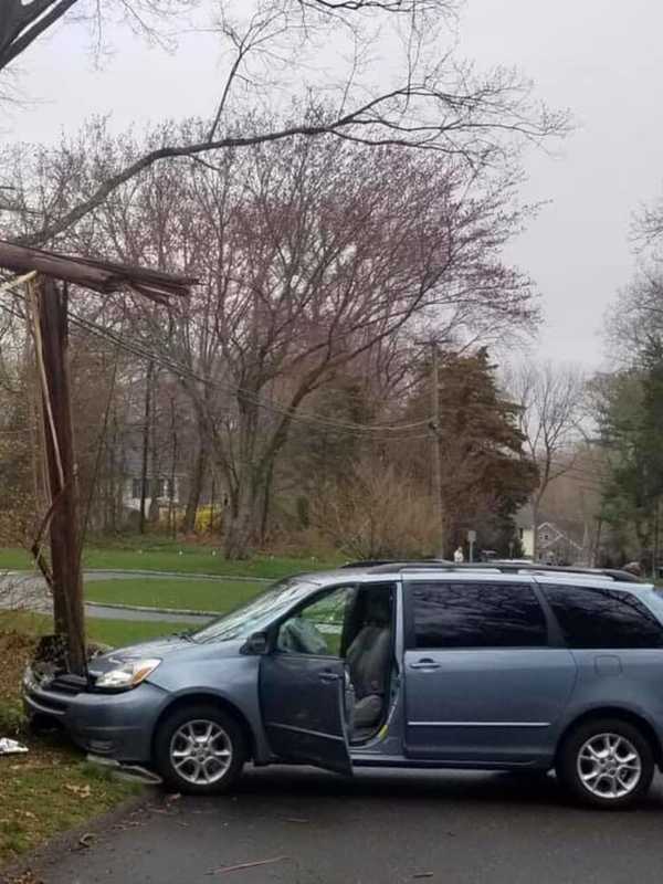 Van Slams Into Utility Pole In Westport